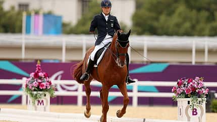 Paralympics, Paralympische Spiele, London 2012, Para-Dressur, Para-Reitsport, Reiten mit Handicap, Steffen Zeibig, Para-Pferd Steffen Zeibig mit seinem Fuchs im Dressurviereck währen der Paralympischen Spiele in London 2012