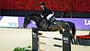 Marcus Ehning über dem Sprung bei den FEI World Cup Finals 2025 Basel. 